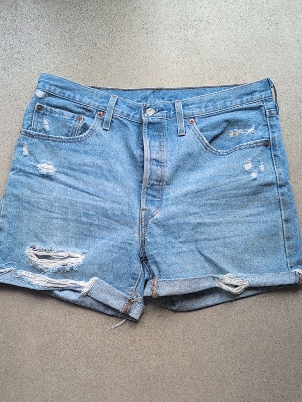 Levi's 501 - sz 32. Light Blue Distressed Rolled-Hem Denim Shorts